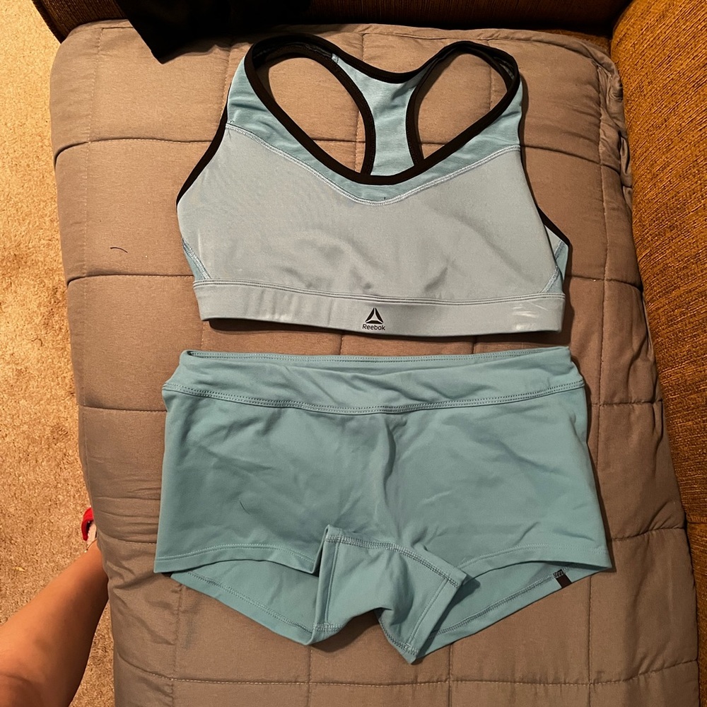 Light blue/ teal women’s workout set size medium